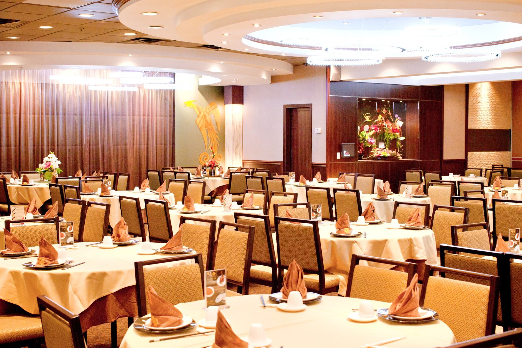 Neptune Seafood Restaurant main dining room with round banquet tables